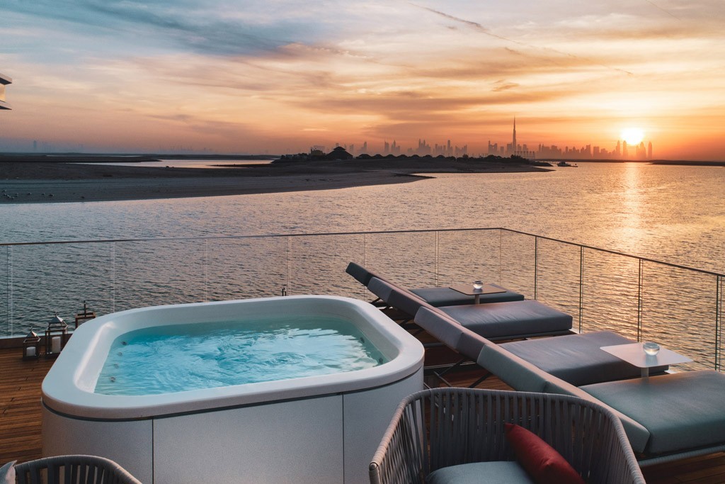 Jacuzzi and sunset deck at Floating Villa Dubai, Heart of Europe