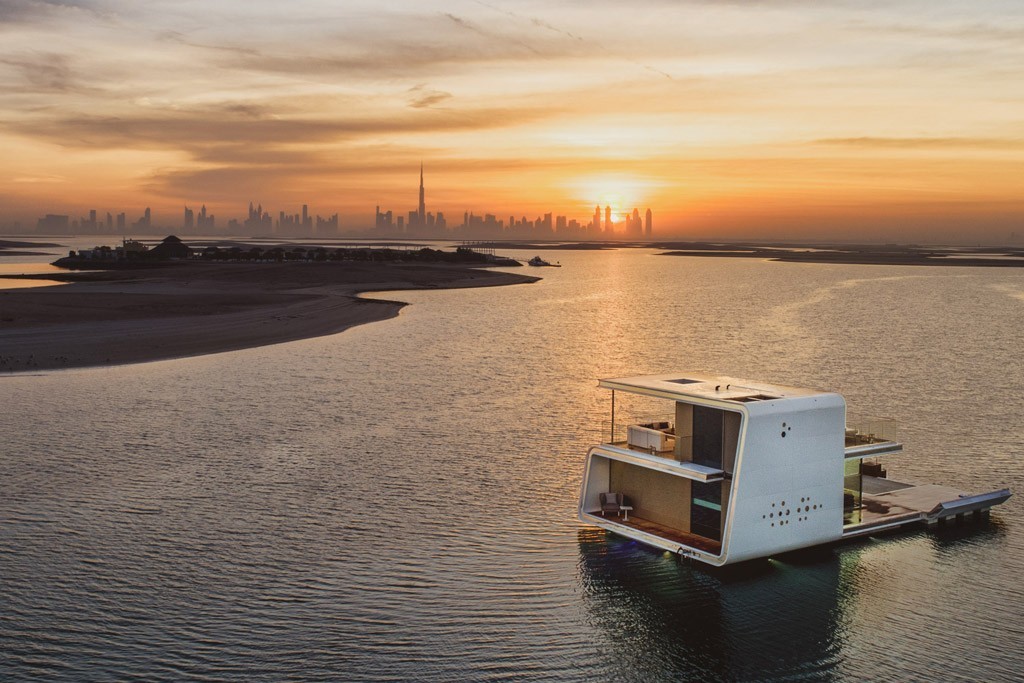 Floating villa on water at sunset, Heart of Europe, Dubai
